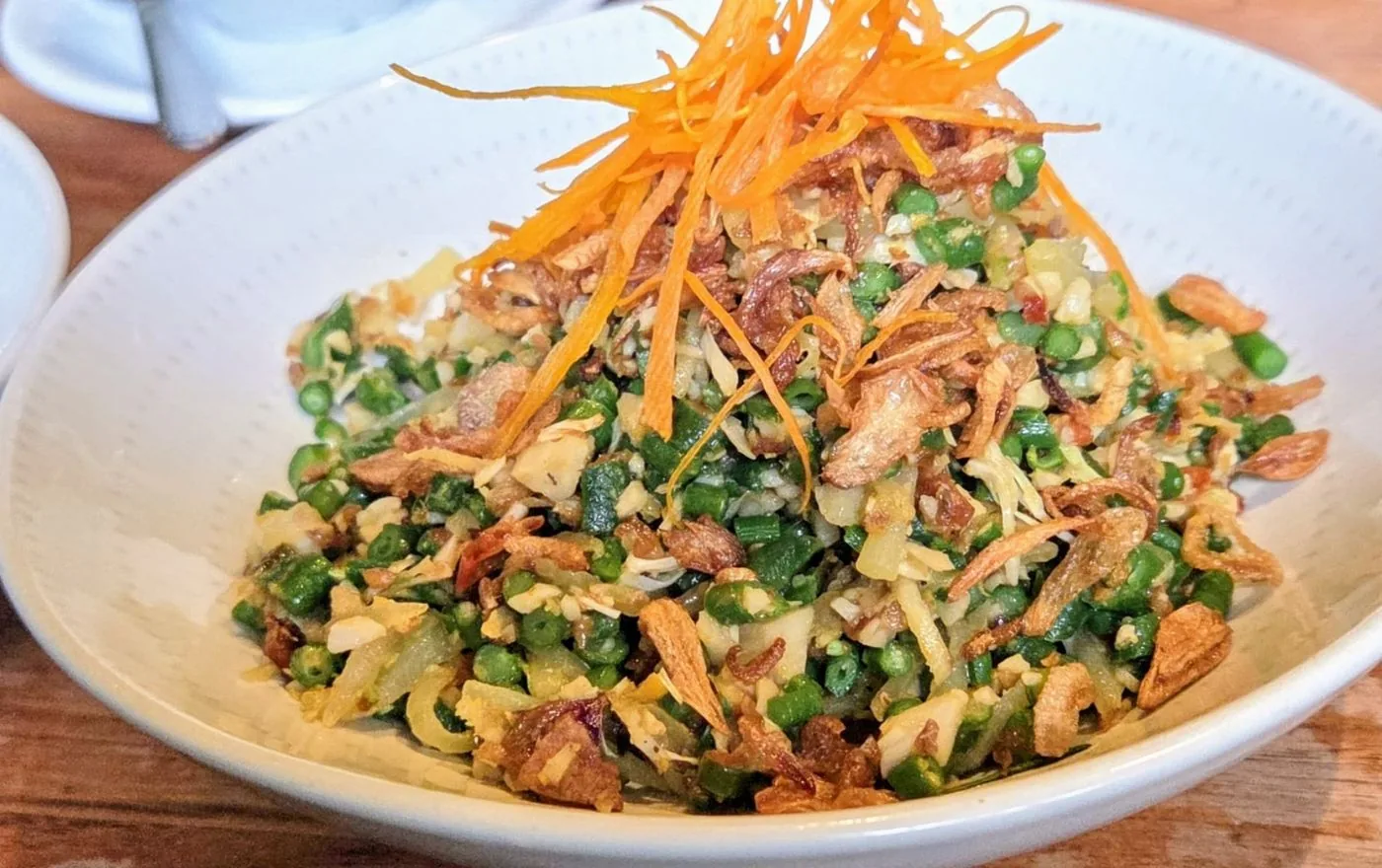 Lawar traditional Balinese salad with grated coconut, vegetables, and aromatic spices