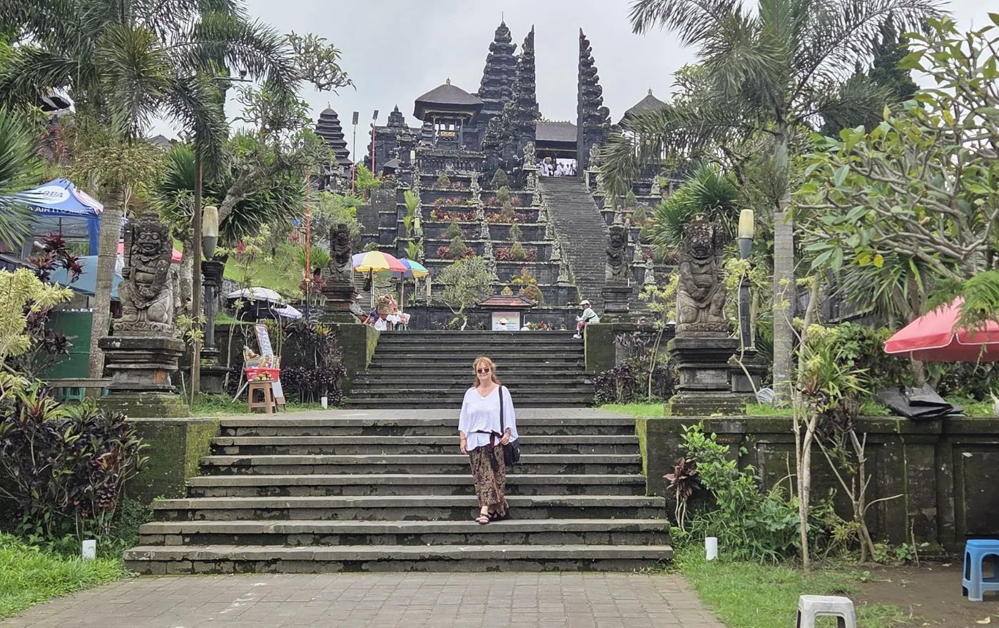 Solo traveler exploring a traditional Balinese temple in Bali